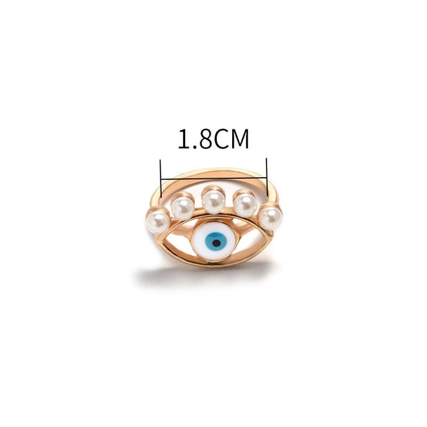 dimensions bague mauvais oeil dorée avec des perles 