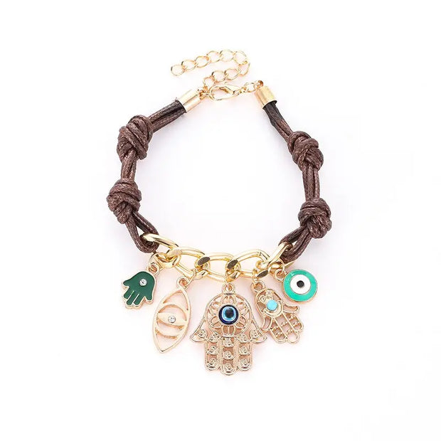 Bracelet evil eyes avec main de Fatma tressé Bijoux Musulmans bracelets Bijoux Musulmans