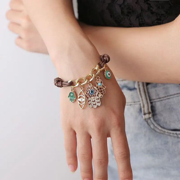 Bracelet evil eyes avec main de Fatma tressé Bijoux Musulmans bracelets Bijoux Musulmans