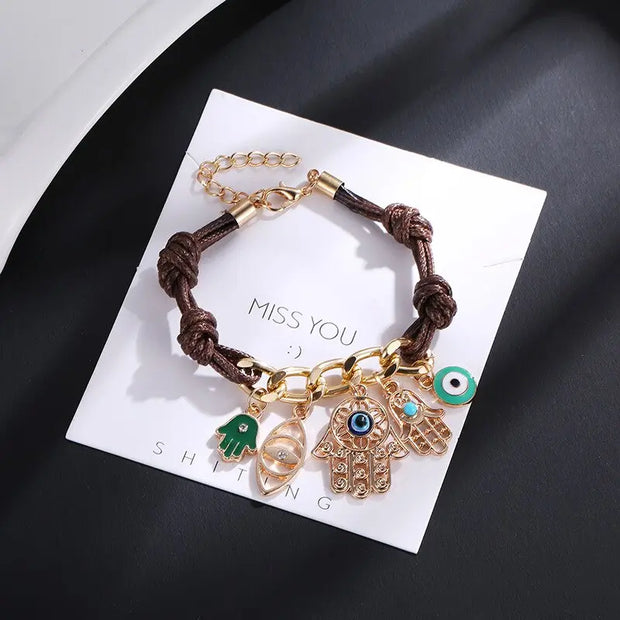Bracelet evil eyes avec main de Fatma tressé Bijoux Musulmans bracelets Bijoux Musulmans