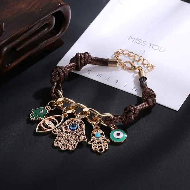 Bracelet evil eyes avec main de Fatma tressé Bijoux Musulmans bracelets Bijoux Musulmans